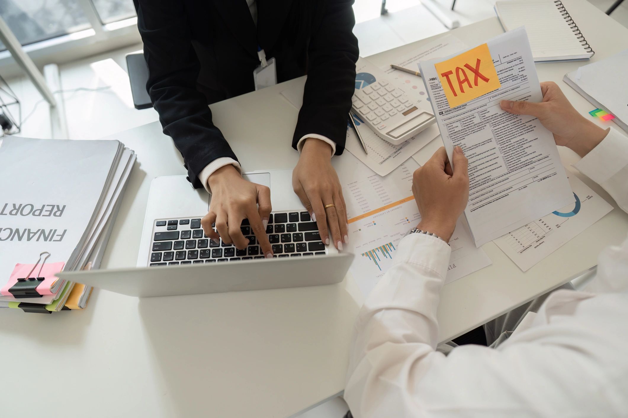 Advisor meeting with a client to review tax strategies